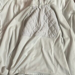 This is a comfy white jacket with pockets! I got it from Walmart!